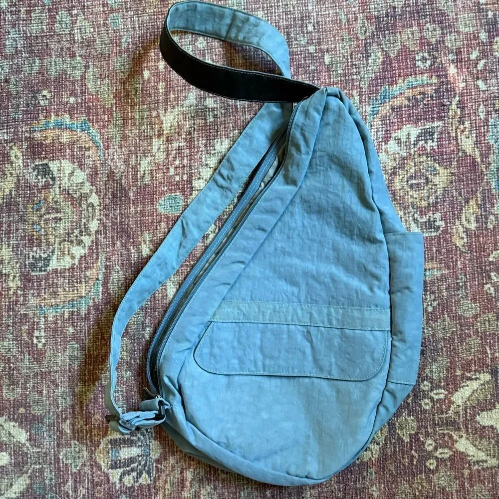 Ameribag light blue crossbody Sling Bag healthy backpack multi pocketed
